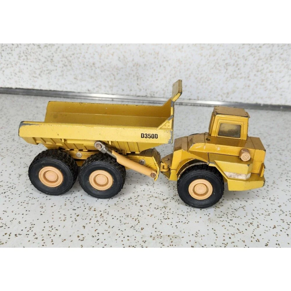 Ertl Mighty Movers 2431 1:50 Caterpillar D350D Articulated Dump Truck Die-Cast